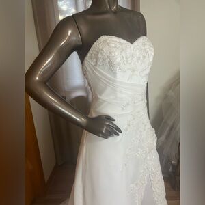 White David’s Bridal style E9351 size 8 with corset lace up back.